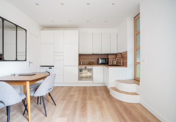 photo de la cuisine blanche après rénovation